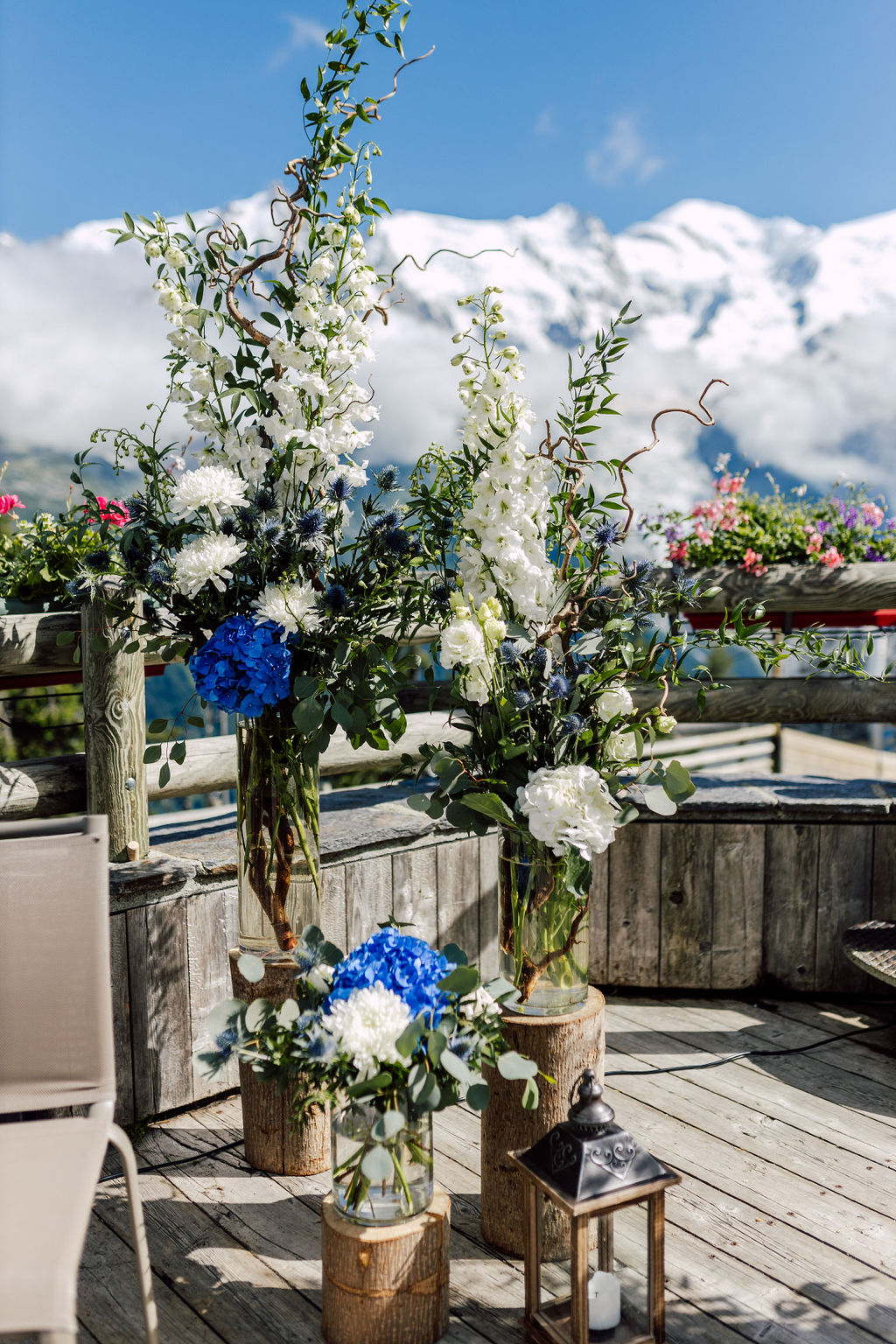 blue white and burch wedding ceremony flowers in vases